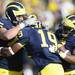 Michigan tight end Devin Funchess celebrates with offensive linesman Michael Schofield  and running back Vincent Smith after scoring a touchdown in the third quarter at Michigan Stadium. Melanie Maxwell I AnnArbor.com